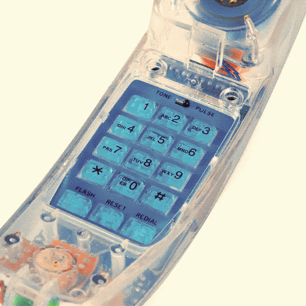 a nineties phone keyboard with clear transparent plastic and colourful insides